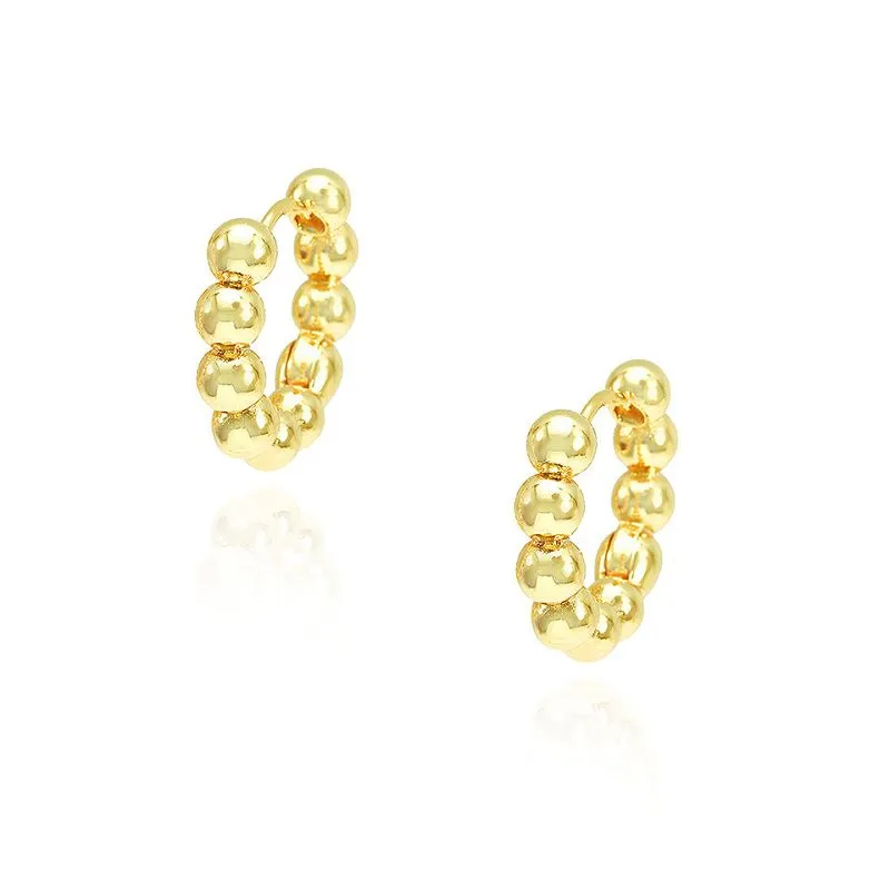 Обеца с лъскави кръгли мъниста